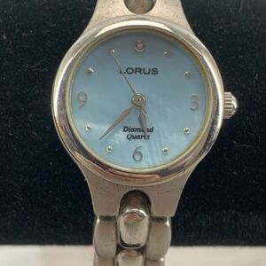 Lorus Women Watch 22mm Round Blue Dial Silver Tone LR0402 , Runs